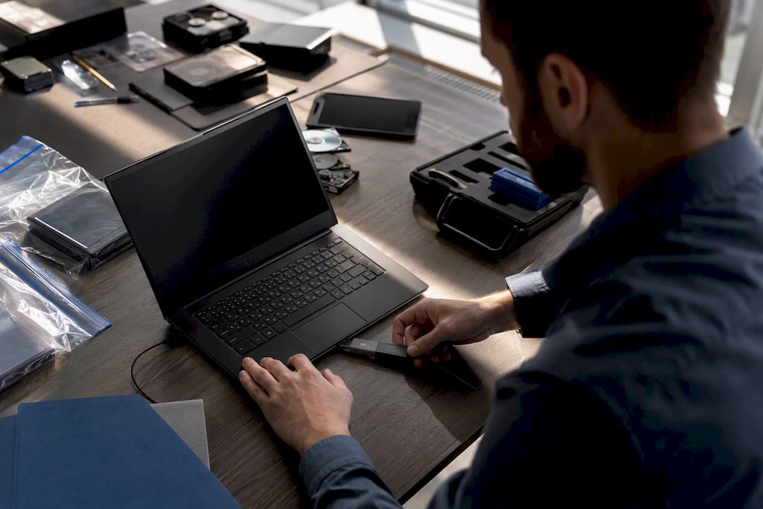 Forensic analyst performing hash verification on device